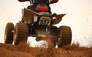 ATV driving on mud