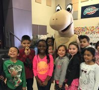 Group of happy school children with Mojave Max mascot